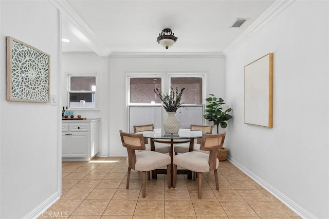 3203 Faust Ave, Long Beach, CA 90808 - dining space featuring crown molding and light tile patterned floors