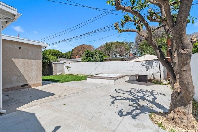3203 Faust Ave, Long Beach, CA 90808 - fenced backyard featuring a patio and a storage shed