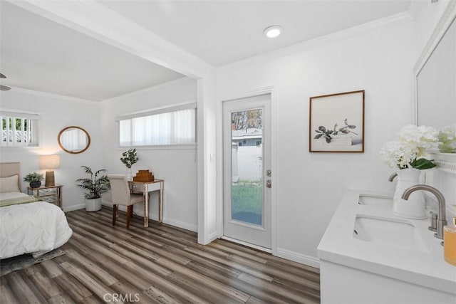 3203 Faust Ave, Long Beach, CA 90808 - bedroom featuring ornamental molding, access to outside, and wood finished floors