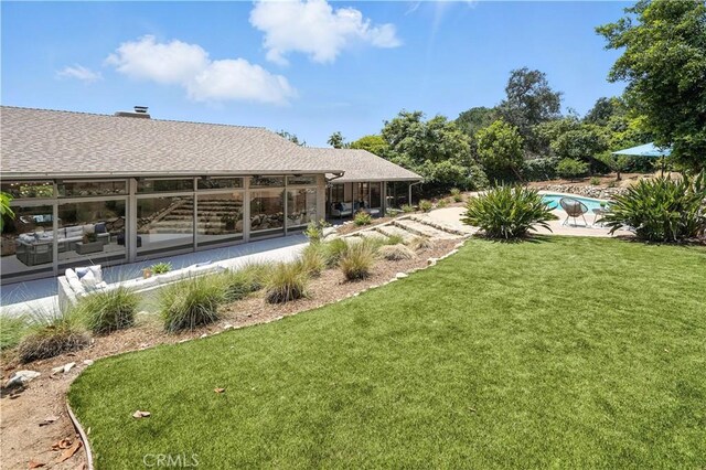 1987 Windover Rd, Pasadena, CA 91107 - view of green lawn featuring an outdoor pool and a patio