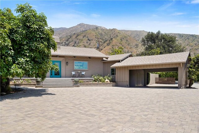 1987 Windover Rd, Pasadena, CA 91107 - single story home with a mountain view, decorative driveway, board and batten siding, and roof with shingles