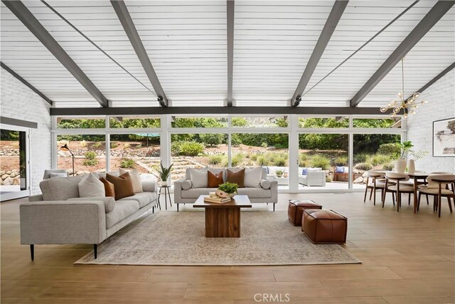 1987 Windover Rd, Pasadena, CA 91107 - sunroom / solarium with healthy amount of natural light, a chandelier, and wood finished floors