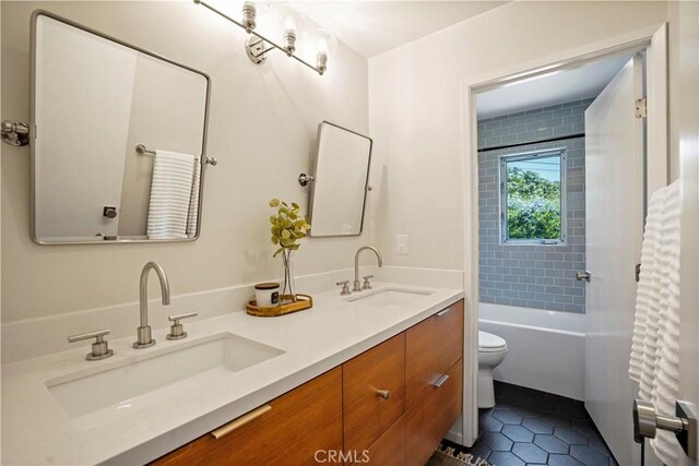 1987 Windover Rd, Pasadena, CA 91107 - full bath with tile patterned floors, double vanity, and bathing tub / shower combination