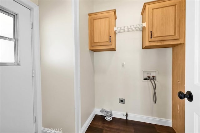 7167 Sunny Vista Rd, Joshua Tree, CA 92252 - laundry room featuring hookup for a washing machine, hookup for an electric dryer, cabinet space, and dark wood-style flooring