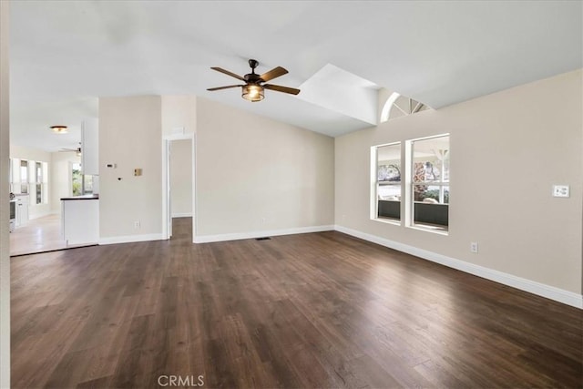 7167 Sunny Vista Rd, Joshua Tree, CA 92252 - unfurnished living room featuring ceiling fan, lofted ceiling, and dark wood-style flooring
