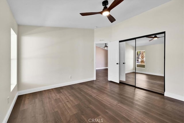 7167 Sunny Vista Rd, Joshua Tree, CA 92252 - unfurnished bedroom featuring vaulted ceiling, wood finished floors, a closet, and a ceiling fan