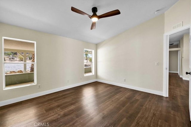 7167 Sunny Vista Rd, Joshua Tree, CA 92252 - spare room with ceiling fan, dark wood finished floors, and a smoke detector
