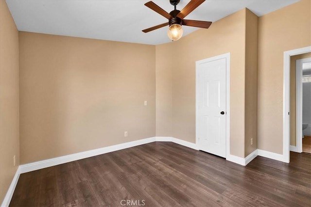 7167 Sunny Vista Rd, Joshua Tree, CA 92252 - unfurnished bedroom featuring dark wood-style floors and a ceiling fan