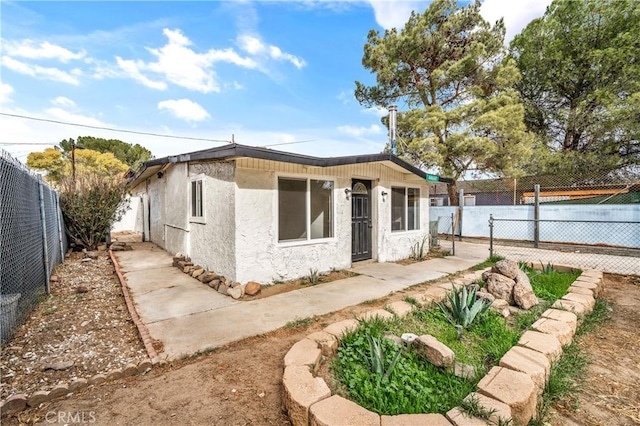 44668 Brawley Ave, Jacumba, CA 91934 - back of house featuring a fenced backyard and stucco siding