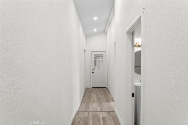 44668 Brawley Ave, Jacumba, CA 91934 - corridor with light wood-type flooring, recessed lighting, and a textured wall