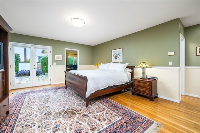 1525 Lafayette Rd, Claremont, CA 91711 - bedroom featuring access to exterior, multiple windows, light wood finished floors, and french doors