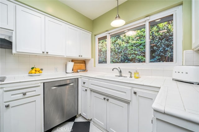 1525 Lafayette Rd, Claremont, CA 91711 - kitchen featuring dishwasher, backsplash, white cabinets, and pendant lighting