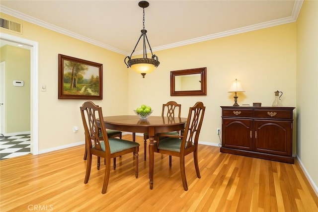 1525 Lafayette Rd, Claremont, CA 91711 - dining space featuring ornamental molding and light wood-style floors