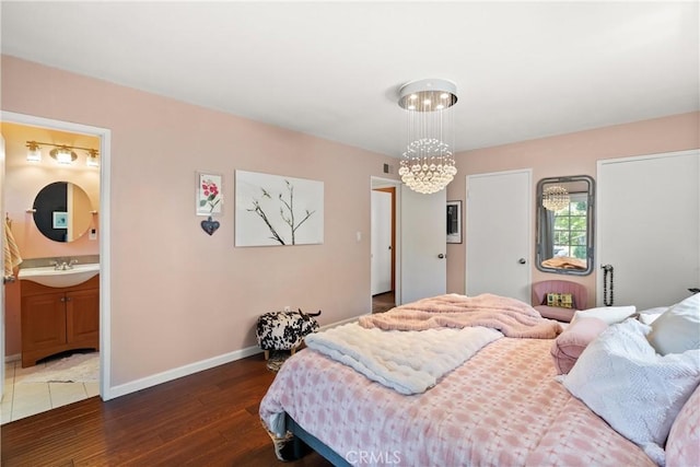 1640 Corsica Pl, Costa Mesa, CA 92626 - bedroom with hardwood / wood-style flooring, a chandelier, and ensuite bath