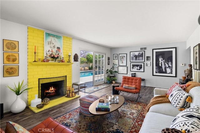 1640 Corsica Pl, Costa Mesa, CA 92626 - living room featuring a fireplace and wood finished floors