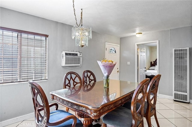 6362 Darlington Ave, Buena Park, CA 90621 - dining area with a heating unit, a chandelier, an AC wall unit, and light tile patterned floors