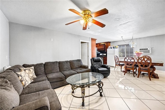 6362 Darlington Ave, Buena Park, CA 90621 - living room with an AC wall unit, ceiling fan, a textured ceiling, light tile patterned flooring, and a chandelier
