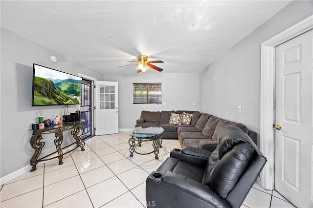 6362 Darlington Ave, Buena Park, CA 90621 - living room featuring a ceiling fan, light tile patterned floors, and a textured ceiling