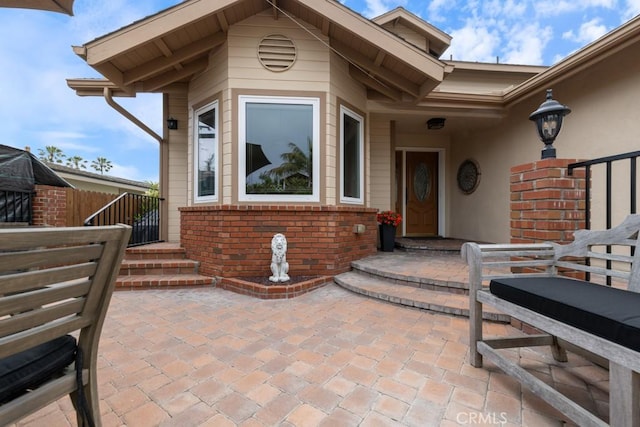 34875 Calle Del Sol, Dana Point, CA 92624 - property entrance with brick siding and a patio area