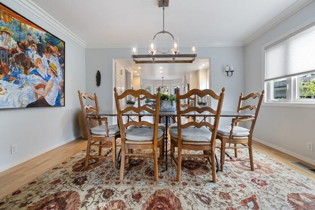 34875 Calle Del Sol, Dana Point, CA 92624 - dining space featuring wood finished floors, a chandelier, and ornamental molding