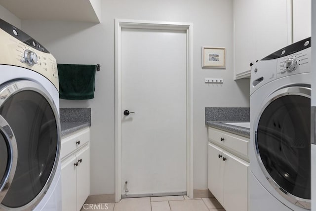 34875 Calle Del Sol, Dana Point, CA 92624 - laundry room featuring washer / clothes dryer, cabinet space, and light tile patterned flooring