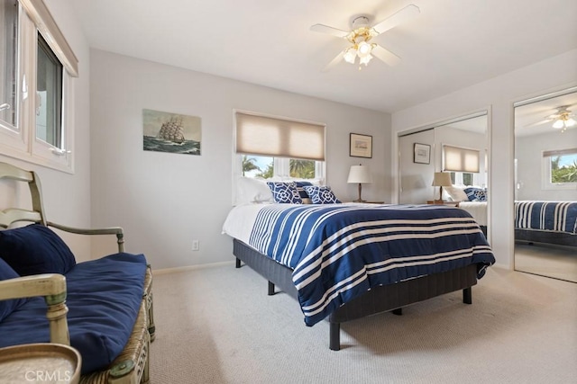 34875 Calle Del Sol, Dana Point, CA 92624 - carpeted bedroom featuring multiple closets and a ceiling fan