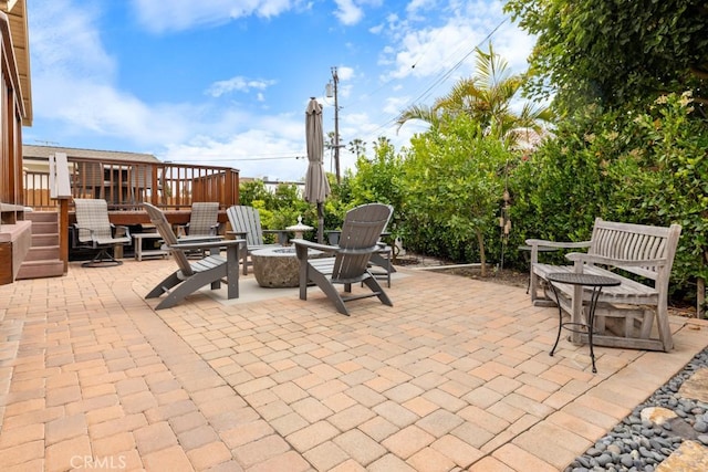 34875 Calle Del Sol, Dana Point, CA 92624 - view of patio / terrace featuring a deck and a fire pit