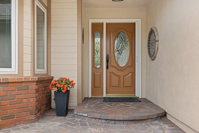 34875 Calle Del Sol, Dana Point, CA 92624 - doorway to property with stucco siding