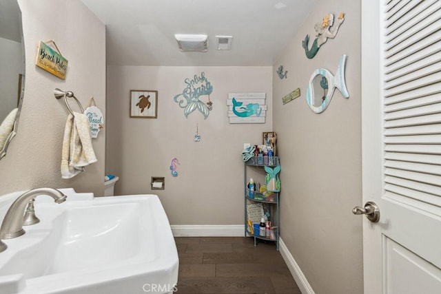 748 S Walnut Ave, San Dimas, CA 91773 - bathroom with a sink and wood finished floors