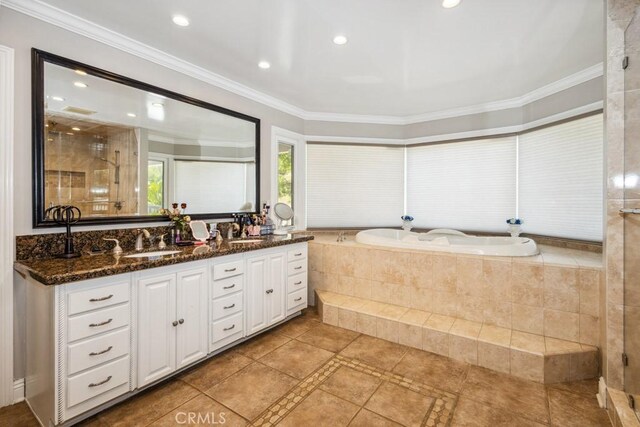748 S Walnut Ave, San Dimas, CA 91773 - bathroom featuring double vanity, a bath, crown molding, a stall shower, and recessed lighting