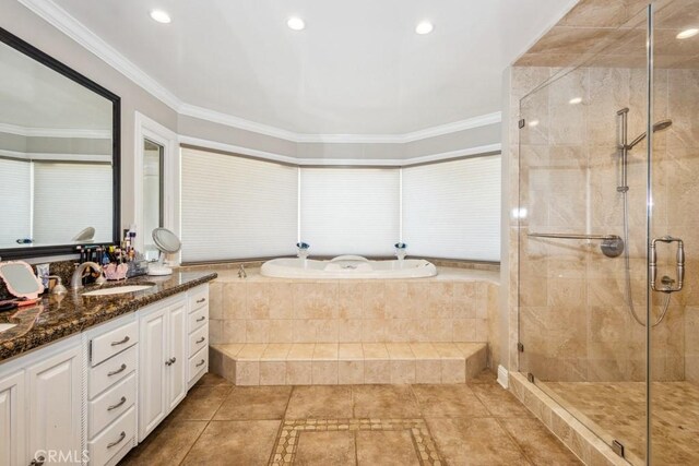 748 S Walnut Ave, San Dimas, CA 91773 - bathroom featuring a garden tub, crown molding, vanity, a shower stall, and tile patterned flooring