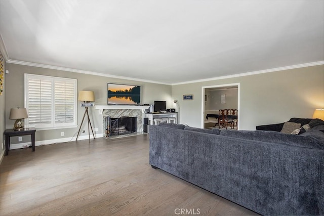 748 S Walnut Ave, San Dimas, CA 91773 - living room featuring wood finished floors, crown molding, and a premium fireplace