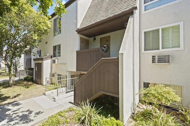 1317 Caminito Gabaldon Unit H, San Diego, CA 92108 - exterior space featuring a shingled roof and stucco siding