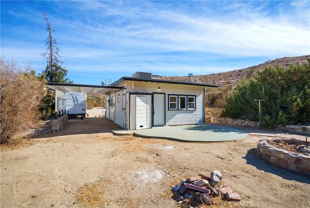 7888 Victor, Yucca Valley, CA 92284 - rear view of house with a mountain view