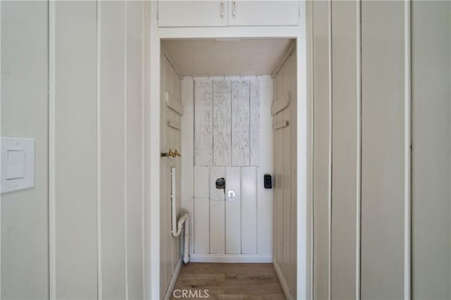 7888 Victor, Yucca Valley, CA 92284 - laundry view of wood finished floors and baseboards