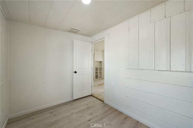 7888 Victor, Yucca Valley, CA 92284 - spare room with light wood-style floors and baseboards