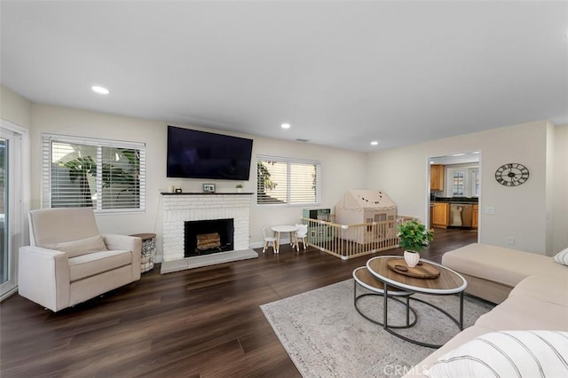 4773 Adler, Oceanside, CA 92057 - living area with dark wood-style flooring, a fireplace, and recessed lighting