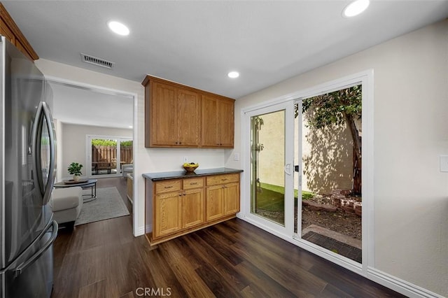 4773 Adler, Oceanside, CA 92057 - kitchen featuring freestanding refrigerator, dark wood-type flooring, recessed lighting, and brown cabinets