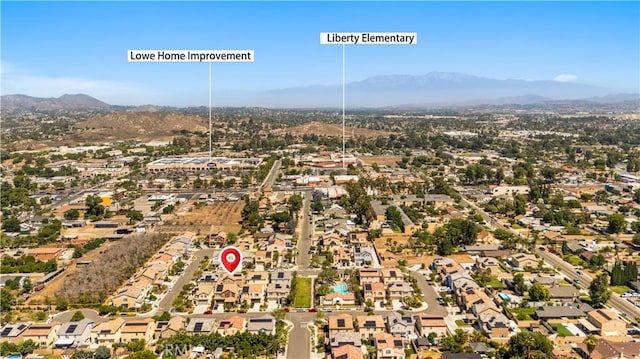 9804 Ardisia St, Riverside, CA 92503 - aerial view of property and surrounding area with a mountainous background and nearby suburban area