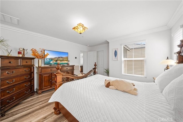 9804 Ardisia St, Riverside, CA 92503 - bedroom featuring light wood finished floors and ornamental molding