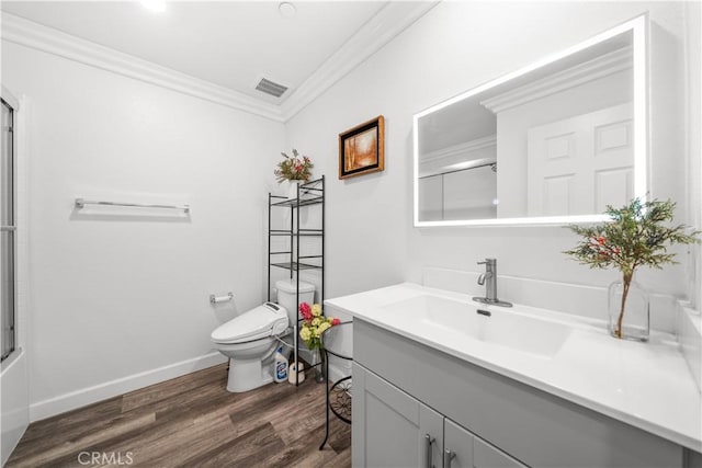9804 Ardisia St, Riverside, CA 92503 - full bath with crown molding, vanity, wood finished floors, and a shower with door