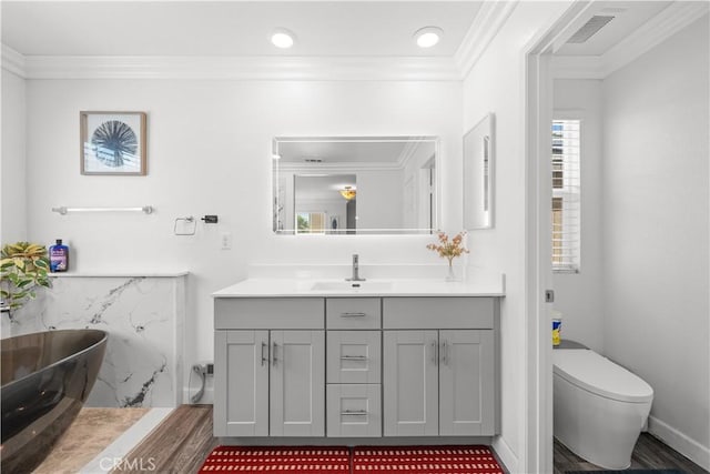 9804 Ardisia St, Riverside, CA 92503 - bathroom featuring a freestanding bath, vanity, and crown molding