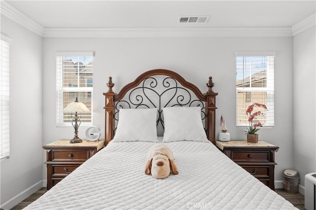 9804 Ardisia St, Riverside, CA 92503 - bedroom featuring dark wood-type flooring, crown molding, and multiple windows