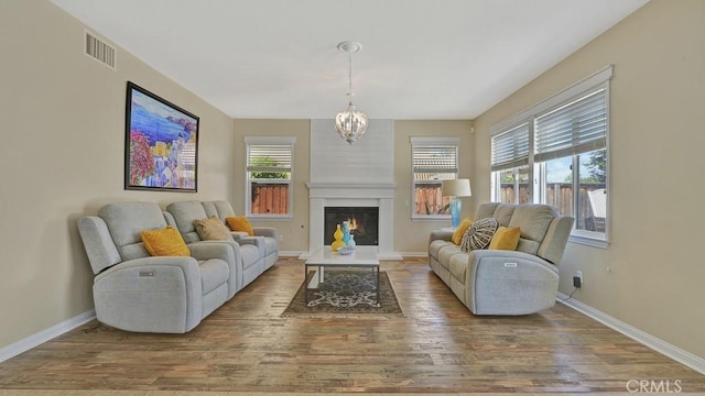 32420 Apricot Tree Rd, Winchester, CA 92596 - living area featuring wood finished floors and a large fireplace