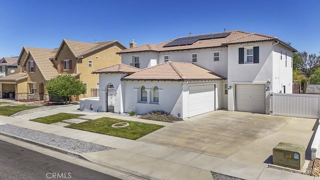 32420 Apricot Tree Rd, Winchester, CA 92596 - mediterranean / spanish-style home featuring stucco siding, solar panels, a tiled roof, driveway, and an attached garage