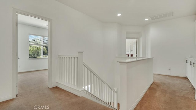 32420 Apricot Tree Rd, Winchester, CA 92596 - corridor with an upstairs landing, light colored carpet, and recessed lighting
