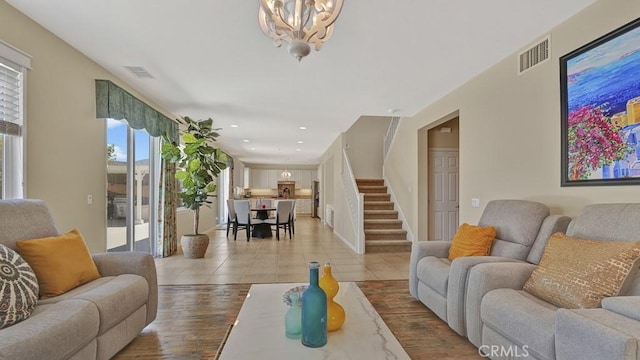 32420 Apricot Tree Rd, Winchester, CA 92596 - living area featuring stairs, a chandelier, recessed lighting, and wood finished floors