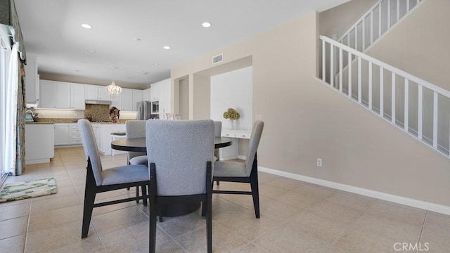 32420 Apricot Tree Rd, Winchester, CA 92596 - dining room with stairway, recessed lighting, a chandelier, and light tile patterned floors