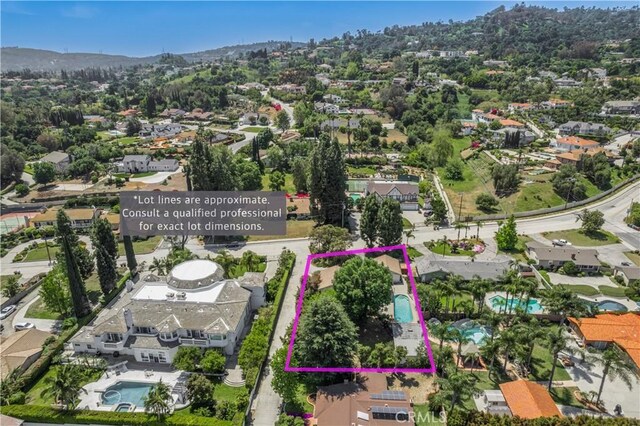1725 Turnbull Canyon Rd, Hacienda Heights, CA 91745 - aerial perspective of suburban area featuring a pool and property boundaries highlighted