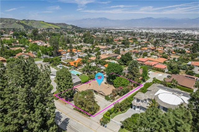 1725 Turnbull Canyon Rd, Hacienda Heights, CA 91745 - aerial view of residential area featuring property parcel outlined and a mountainous background